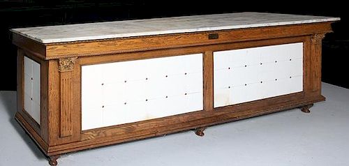 Butcher's front cabinet, "John E. Smith's Sons Co. Butchers Supplies, Rochester, NY", white marble top, golden oak with fancy