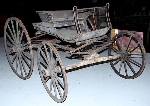 War Between the States era buckboard buggy with fancy ironwork, front spring has Ram's horn handmade finial, original seat, b