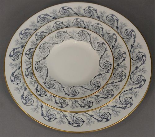 Partial set of Wedgwood china including eleven dinner plates (dia. 11in.), twelve luncheon plates, and twelve bread plates.