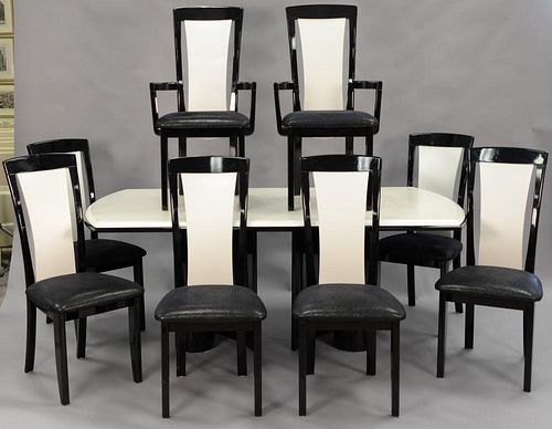 Ten piece contemporary dining set with eight chairs, table with two 15" leaves, sideboard and custom pads for table. ht. 30 1