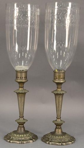 Pair of Sheffield candlesticks with hurricane etched glass shades. ht. 23in.