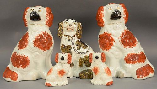 Five piece lot of Staffordshire dogs including small pair, large pair, and a single. ht. 5in, 12in. & 9 1/2in.