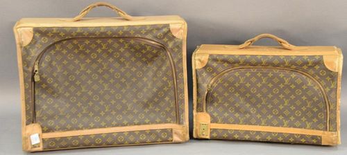 Two Louis Vuitton soft shell canvas and leather suitcases. 15 1/2" x 20 1/2" and 20 1/2" x 22 3/4"