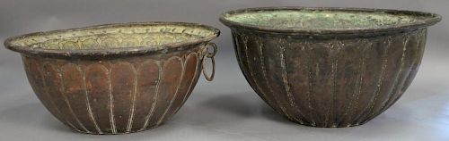 Pair of large copper and iron bowls or kettles having iron ring, rim, and iron handle with an overall embossed leaf circle de