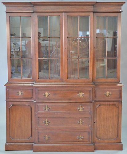 Mahogany breakfront with center drawer with drop front desk. ht. 82in., wd. 66in.