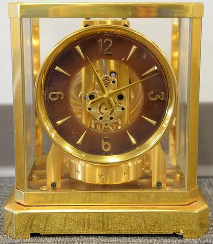 LeCoultre Atmos clock, brass and glass case. ht. 9 1/4in., wd. 7 1/2in.