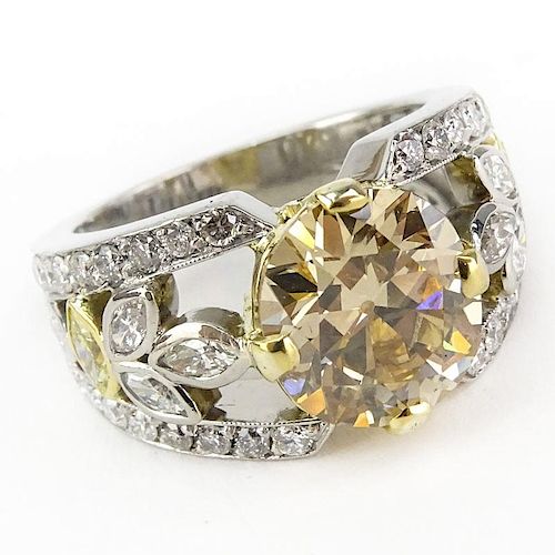 GIA Certified 4.04 Carat Fancy Brownish Yellow Diamond and Platinum Engagement Ring .