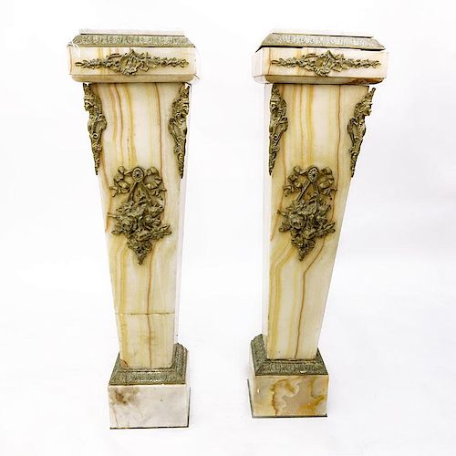 Pair of Antique Onyx Pedestal with Marble Tops.