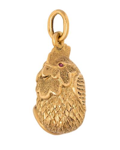 A FABERGE GOLD EGG PENDANT IN THE FORM OF A ROOSTER WITH RUBY EYES, ALEXANDER TILLANDER, ST. PETERSBURG, 1898-1903