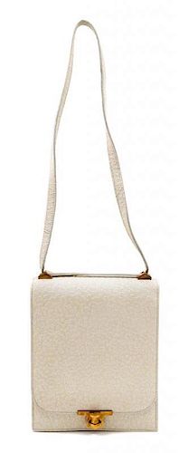 * An Hermes Ostrich Flap Handbag. 7.5" x 9" x 2".