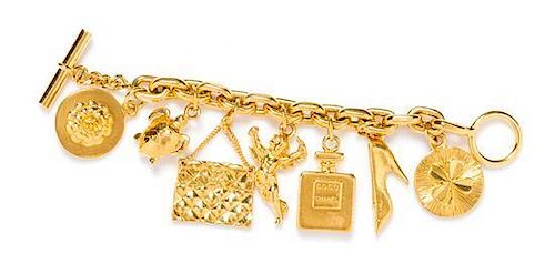 A Chanel Goldtone Charm Bracelet, 7.25".