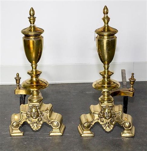 A Pair of Brass Andirons Height 18 inches.