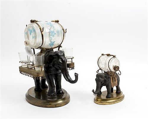 * A Cast Metal and Brass Elephant Form Decanter Set Height of first overall 12 1/2 inches.