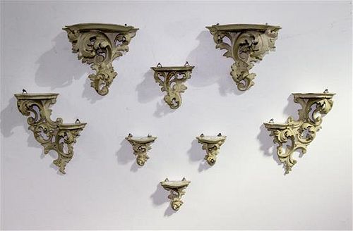 * A Collection of Eight Painted Rococo Brackets
