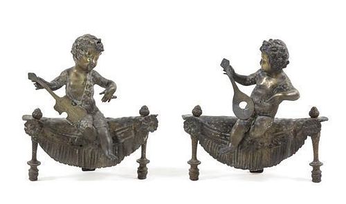 * A Pair of Continental Gilt Metal Figural Andirons Height 13 inches.