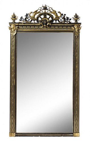 * A Victorian Neoclassical Partial Ebonized and Gilt Pier Mirror