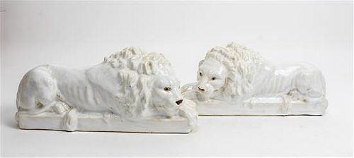 * A Pair of Italian Ceramic Models of Lions Height 5 1/2 x width 12 1/4 inches.