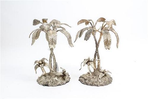 * A Pair of Silvered Metal Models of Palm Trees Height 9 3/4 inches.