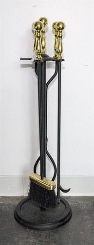 An Assembled Set of Metal Fireplace Tools Height of stand 31 inches.