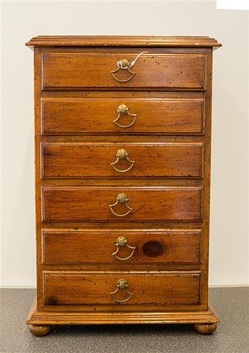 A Georgian Style Diminutive Oak Chest of Drawers Height 19 1/4 x width 12 1/2 x depth 9 3/4 inches.