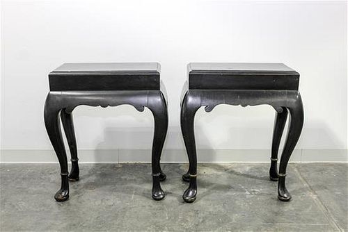 A Pair of Ebonized Side Tables Height overall 28 1/4 x width 25 x depth 13 1/2 inches.