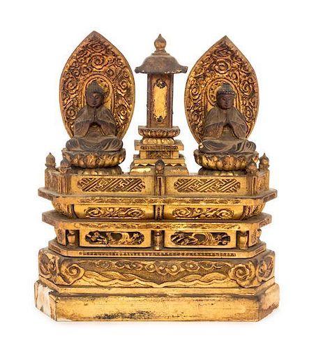 A Gilt Lacquered Wood Shrine with Two Buddha Figures Height 9 x width 8 x depth 2 1/4 inches.