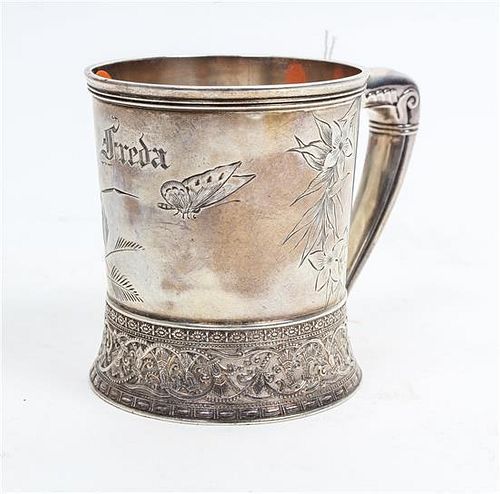 An American Silver Children's Mug, Gorham Mfg. Co., Providence, RI, 1882, of tapering, cylindrical form with a C-scroll handl