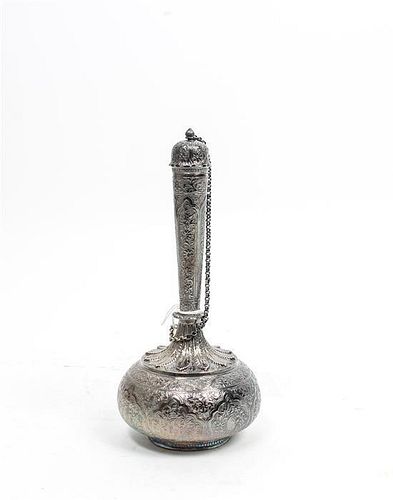 A Middle Eastern Rosewater Dropper, , the tapering neck and globular body decorated with floral and foliate motifs throughout