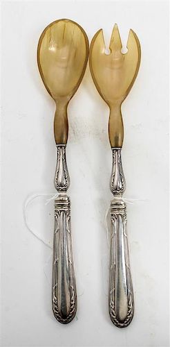 * A French Silver Two-Piece Salad Serving Set, Emile Puiforcat, Paris, the handles with bundled foliate borders and having ho