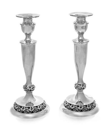 * A Pair of American Silver Candlesticks, Mueck-Carey, Mid-20th Century, of baluster form with openwork base.