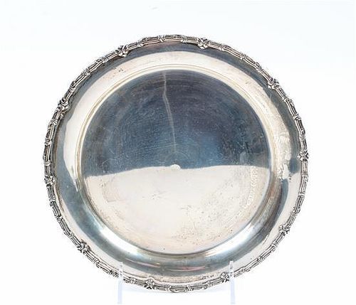 * A Portuguese Silver Plate, 19TH/20TH CENTURY, of circular form with decorated edge.