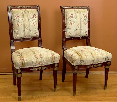 Pair of 19/20th Century French Empire style Bronze Mounted Mahogany and Upholstered Side Chairs.