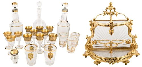 A FRENCH GLASS AND ORMOLU CORDIAL SET WITH THREE DECANTERS