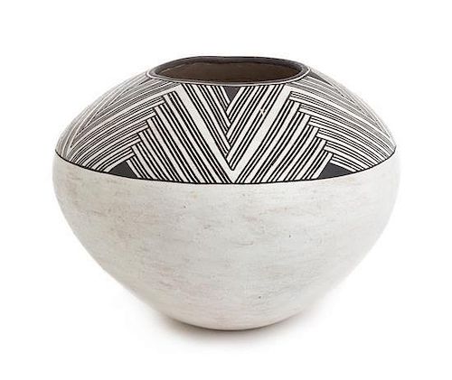 A Lucy Martin Lewis (Acoma, 1898-1992), Black and White Fine Line Jar Height 6 x diameter 7 1/2 inches