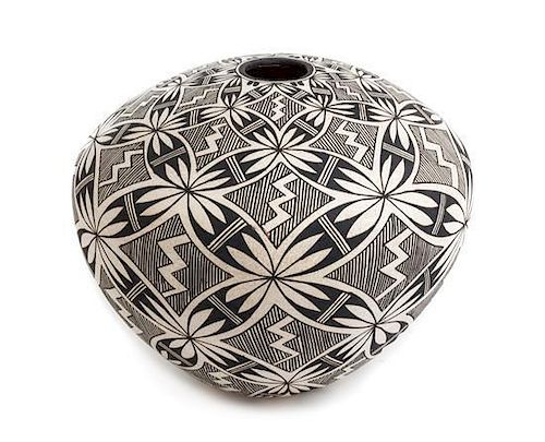 A Marie Zieu Chino (Acoma, 1907-1982), Fineline Black on White Seed Jar Height 6 1/2 x diameter 8 inches
