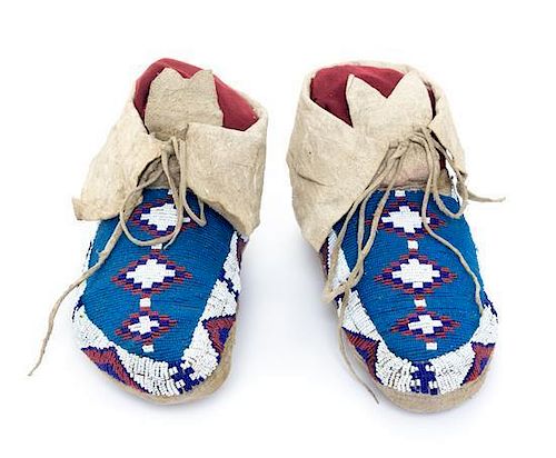 A Pair of Sioux Beaded Hide Moccasins Length 11 inches