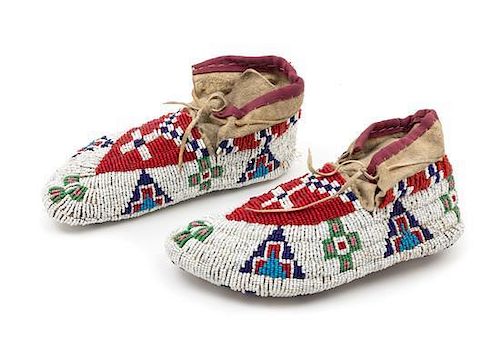 A Pair of Fully Beaded Sioux Moccasins Length 7 3/4 inches