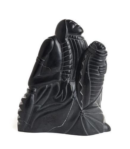 A Carved Black Soapstone Figure, by John Suazo (American, b. 1951) Height 8 inches
