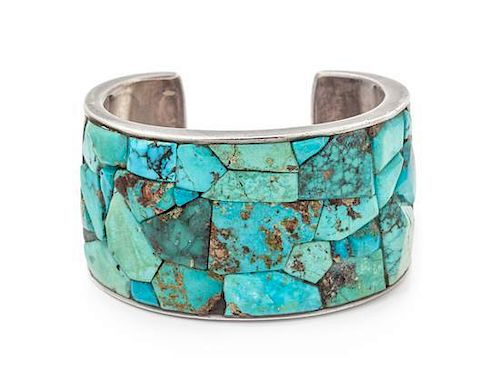 A Hopi Silver and Turquoise Cuff Bracelet, Charles Loloma (1921-1991) Length 5 1/4 x opening 1 x width 1 1/2 inches.