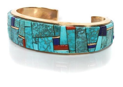 A Hopi 14 Karat Yellow Gold, Turquoise, Lapis and Coral Cuff Bracelet, Charles Loloma (1921-1991) Length 5 5/8 x opening 1 1/