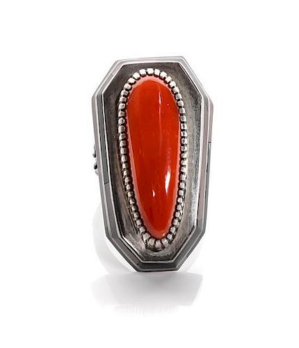 A Navajo Silver, Coral and Jet Ring, Gibson Nez (1947-2007)