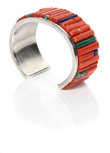 A Navajo Coral, Lapis and Turquoise Cobblestone Cuff Bracelet, Patrick Yellowhorse Length 5 1/2 x opening 1 1/8 x width 1 inc