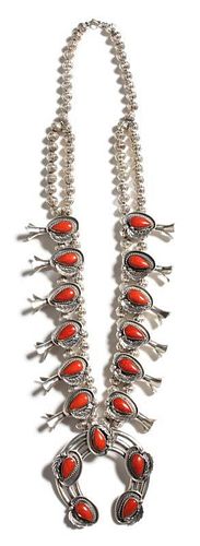A Navajo Silver and Coral Squash Blossom Necklace Length 24 inches.