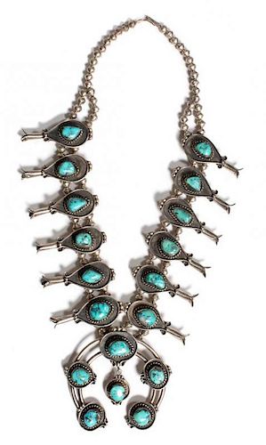 A Large Navajo Silver and Turquoise Squash Blossom Necklace Length 25 inches.
