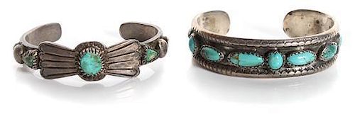 Two Southwestern Silver and Turquoise Bracelets Length of one 5 7/8 x opening 1 1/8 x width 3/4 inches.