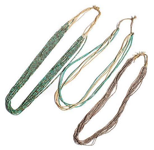 Three Fine Zuni Turquoise and Shell Heishi Necklaces Length of longest 28 inches.