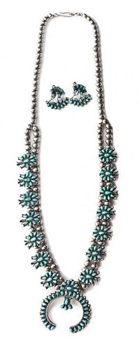 A Zuni Silver and Turquoise Petit Point Squash Blossom Necklace Length of necklace 24 inches.