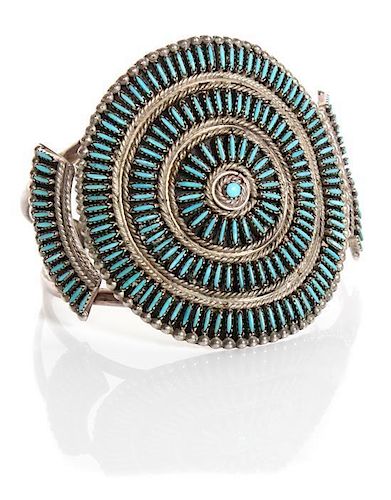 A Zuni Silver and Turquoise Petit Point Concha Belt and Bracelet Length of belt 38 inches.