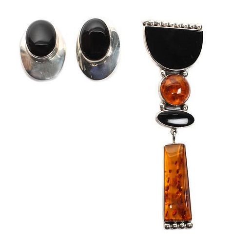 A Kewa Silver, Onyx and Amber Brooch, Sam Lovato (1935-1999) Height 4 1/2 inches.
