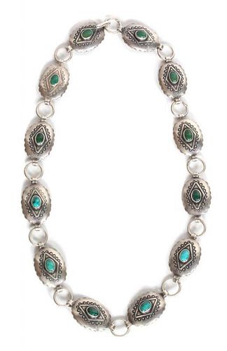 A Southwestern Silver and Turquoise Necklace Length 15 1/2 inches.